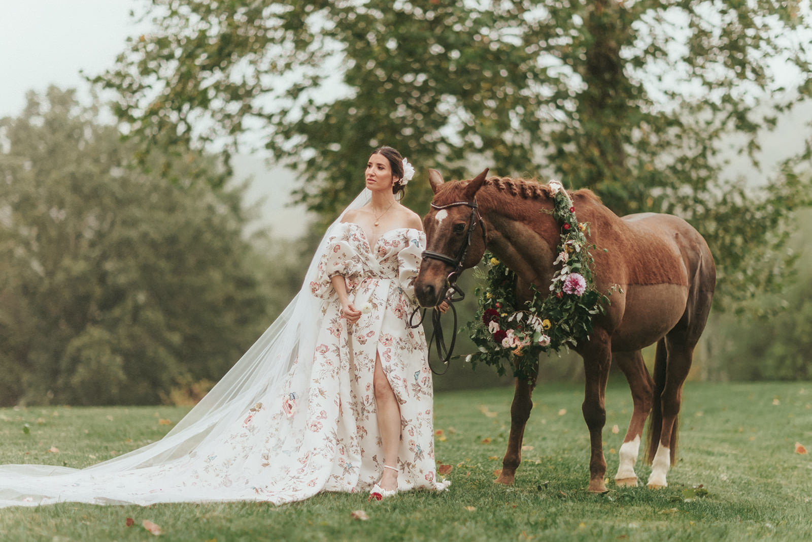 bride in floral wedding dress standing with horse in blacksburg VA