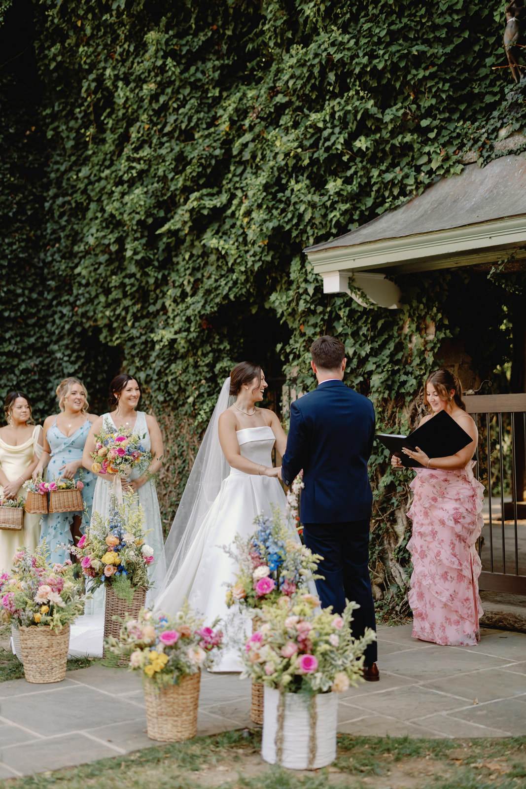 Goodstone Inn wedding ceremony at ivy wall